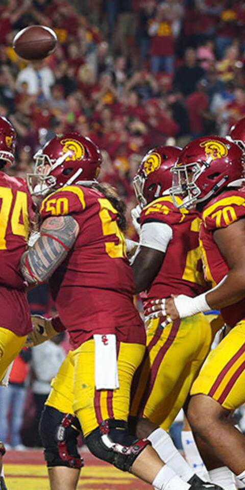 Sam Darnold of the USC Trojans and his teammates celebrate during a college football game between the UCLA Bruins vs USC Trojans at the Los Angeles Memorial Coliseum in Los Angeles, CA. 