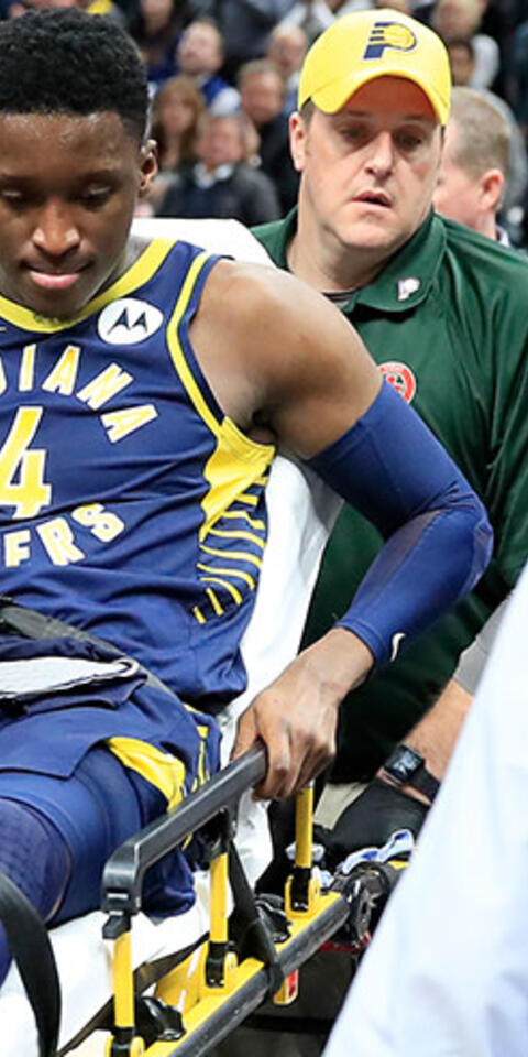 Victor Oladipo #4 of the Indiana Pacers is taken off of the court on a stretcher after being injured in the second quarter of the game against the Toronto Raptors at Bankers Life Fieldhouse on January 23, 2019 in Indianapolis, Indiana.