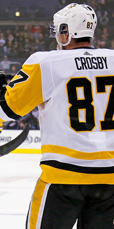 Sidney Crosby #87 of the Pittsburgh Penguins is congratulated by Evgeni Malkin #71 after scoring a goal during the third period of the game against the Columbus Blue Jackets on February 26, 2019 at Nationwide Arena in Columbus, Ohio. Pittsburgh defeated Columbus 5-2.