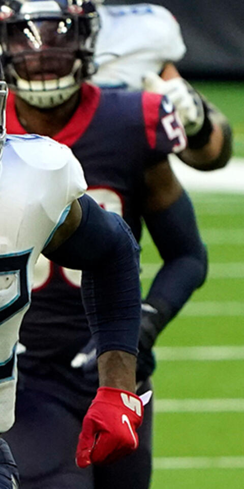 Tennessee Titans running back Derrick Henry (22) runs for a touchdown as Houston Texans' Jacob Martin (54) and Zach Cunningham (41) chase during an NFL football game on Jan. 3, 2021, in Houston.